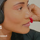 Person wearing black Things Audio over-ear FM radio headphones listening to music