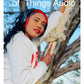 Person wearing red and black Things Audio FM radio over-ear headphones outdoors