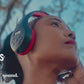 Person wearing black and red Things Audio FM radio over-ear headphones listening to music